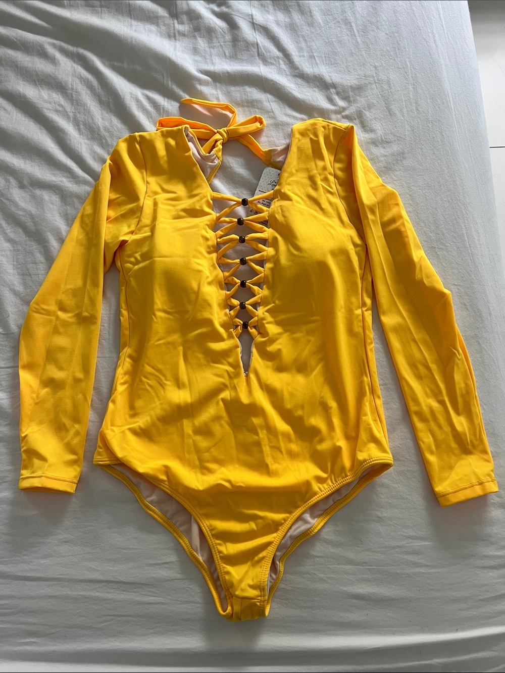 Long-Sleeve Lace-Up One-Piece Swimsuit in Yellow